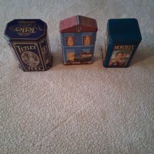 Lot Of 3 Vintage Tins -  Tetley Tea, Nestle, And Hersheys Blue and Multicolor